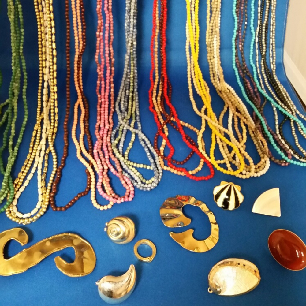 Vintage beaded jewelry bundle with fasteners.